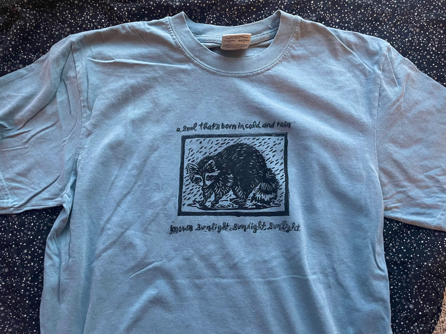 Marty- Rainy Raccoon Handprinted T-Shirt